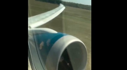 Der Start der Boeing 787 von Vietnam Airlines aus Passagiersicht: Deutlich über das Pistenende in München hinaus.