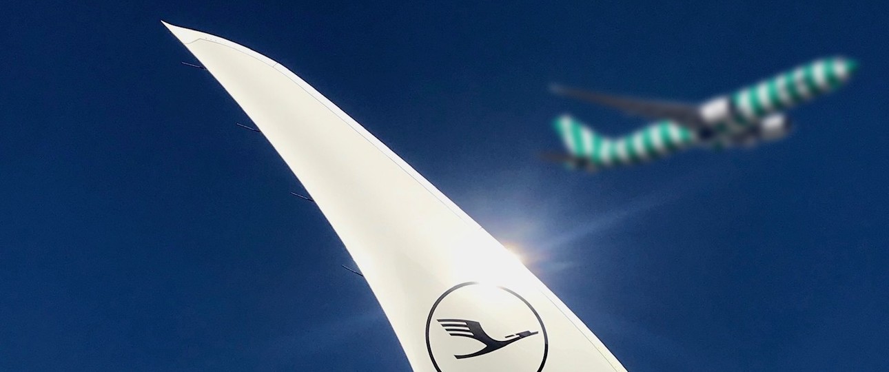 Flügelspitze von Lufthansa und Flugzeug von Condor: Der Zubringerstreit ist noch nicht zu Ende.