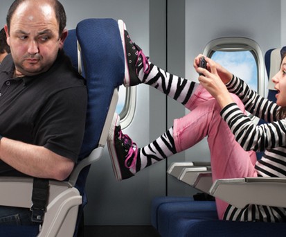 Passagiere ind er Economy: Oftmals schwieriges Zusammenleben.