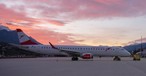 Embraer E195 von AUA am Flughafen Innsbruck: Die Österreicher bauen ihr Angebot zwischen Wien und Innsbruck deutlich aus.