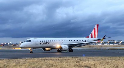 Embraer E190 von German Airwas mit Condor-Streifen: Nun bunt im Einsatz.
