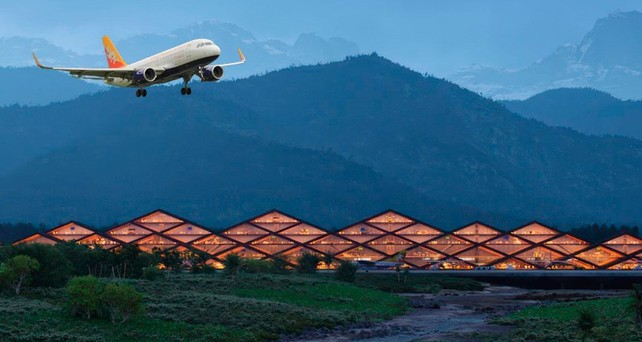 Airbus A319 von Drukair über der Gelephu Mindfulness City (Montage): Die Airline verspürt große Nachfrage.