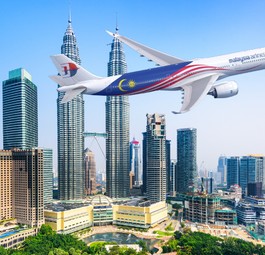 Airbus A330-900 von Malaysia Airlines vor der Skyline der Hauptstadt Kuala Lumpur: Könnte so aussehen.
