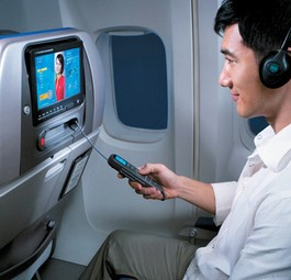 Economy-Passagier bei Cathay: Künftig iPad statt Bildschirm.