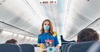 Flight attendant of Ukraine International Airlines in a Boeing 737: From December, the short- and medium-haul jet will connect Kiev and New York.