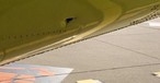 Das Loch: Sah es der Pilot von selbst oder erst, als ihn die Passagiere darauf hinwiesen?