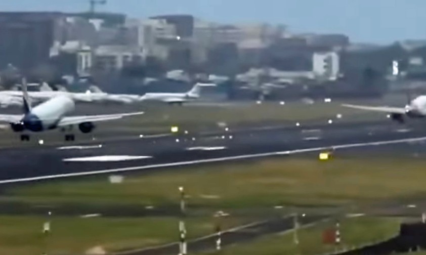 Airbus A320 Neo landet auf Piste, auf der A320 Neo gerade startet
