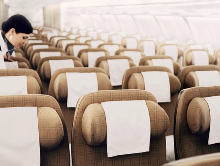 Kabine eines Airbus A330 von Swiss:S chick, aber in die Jahre gekommen.