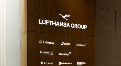 Die neue Dachmarke: Ein Kranich für die Gruppe.