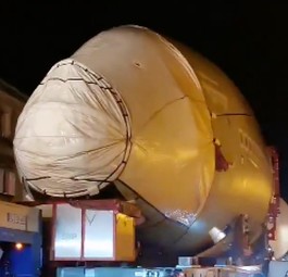 The nose section of an Airbus A380 rolls through a small town in the south of France.