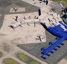 Das geplante neue Inlandsterminal und der geplante neue Bahnhof (in Blau): Heftige Opposition von zwei zentralen Kunden.