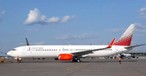 Eine Boeing 737-900 der russischen Airline Rossiya: Die Lackierung erinnert noch stark an Lion Air.