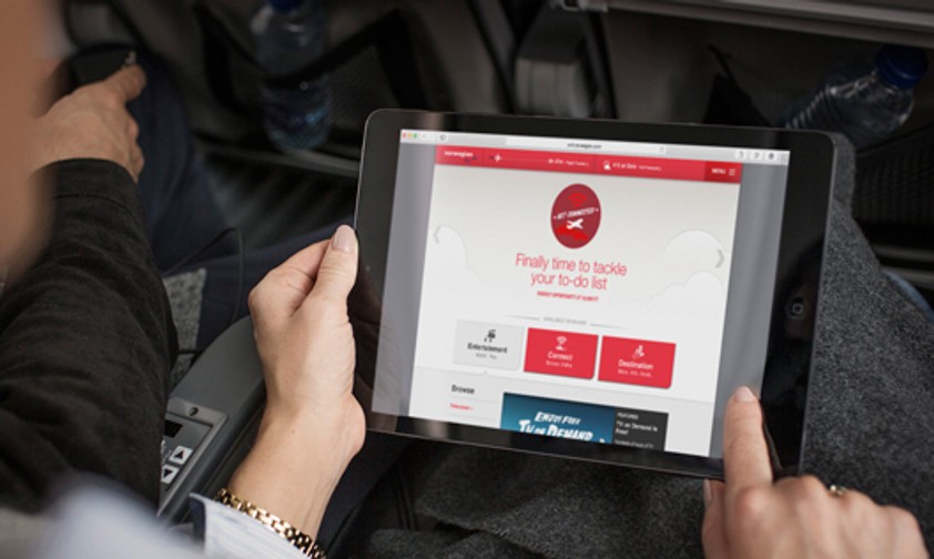 Tablet an Bord: Bei wenigen Airlines ist das Surfen kostenfrei.
