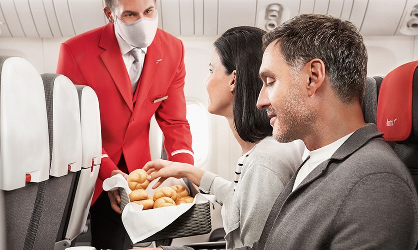 Passagiere von Austrian Airlines: Wer bezahlt, bekomme einen vollwertigen Snack.