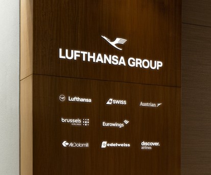 Die neue Dachmarke: Ein Kranich für die Gruppe.