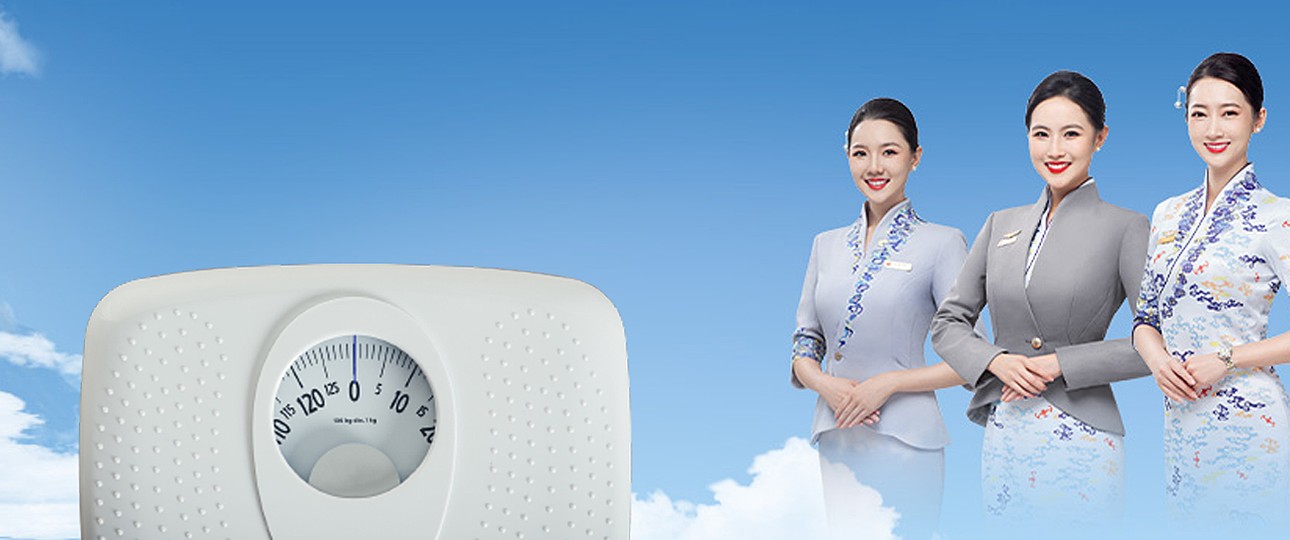 Flugbegleiterinnen von Hainan Airlines: Müssen ihr Gewicht kontrollieren.