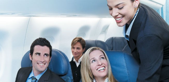 Business-Passagiere von Air Canada: Auch mehr US-Bürger sollen bald so strahlen.