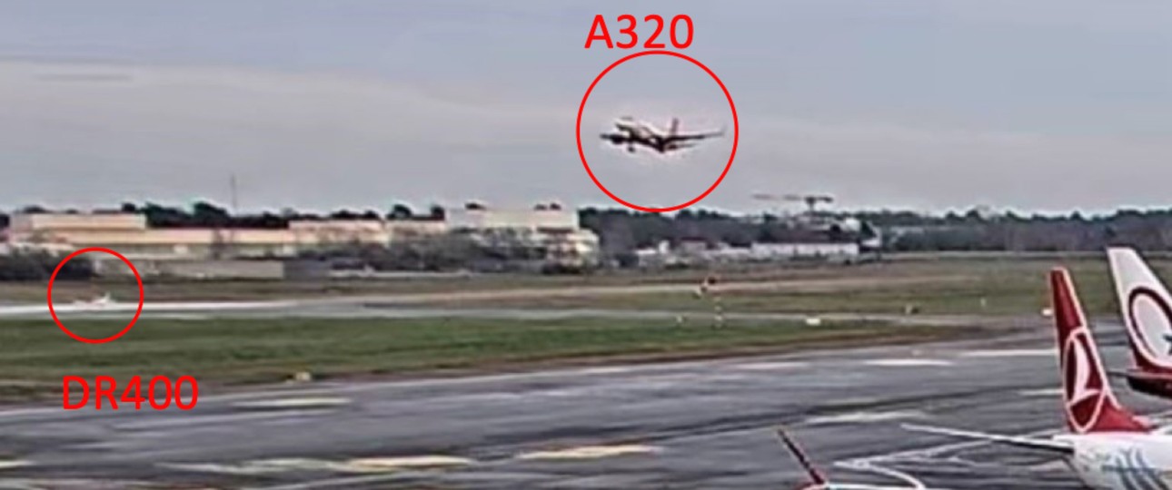 Aufnahme einer Sicherheitskamera: Der A320 wollte auf der Piste landen, auf der die Robin DR 400 stand: