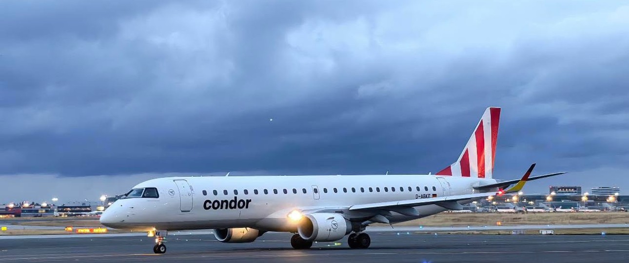 Embraer E190 von German Airwas mit Condor-Streifen: Nun bunt im Einsatz.