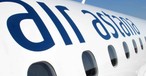 Schriftzug Air Astana auf einer Embraer: Die Airline setzt auf Wachstum.