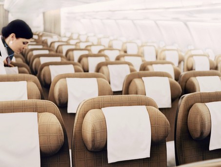Kabine eines Airbus A330 von Swiss:S chick, aber in die Jahre gekommen.