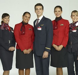 Flugbegleiter von LAN und TAM: Künftig fliegen Sie unter einer Einheitsmarke.