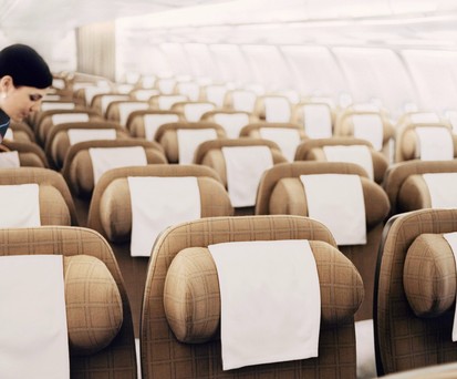 Kabine eines Airbus A330 von Swiss:S chick, aber in die Jahre gekommen.