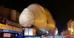 The nose section of an Airbus A380 rolls through a small town in the south of France.