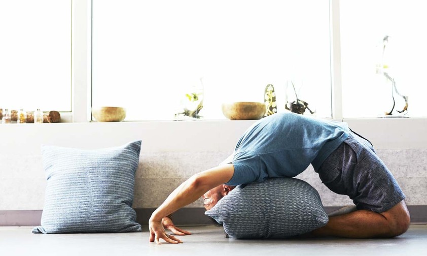 Yogaübung: Lernen, mit dem Stress besser umzugehen.