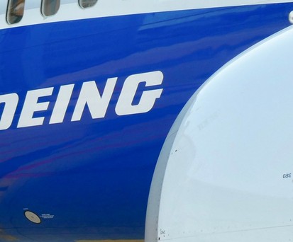 Flieger mit Boeing-Logo: Der Hersteller zahlt an Hinterbliebene.