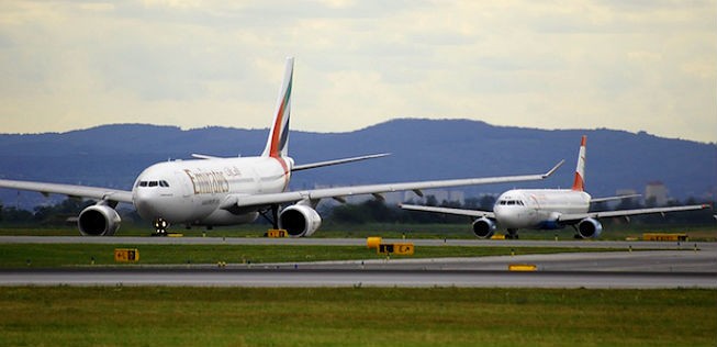 Flieger von Emirates und AUA: In Duabi sieht man die österreichische Airline künftig nicht mehr.