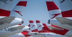 Geparkte Flieger von Austrian Airlines: Nicht alle heben wieder ab.