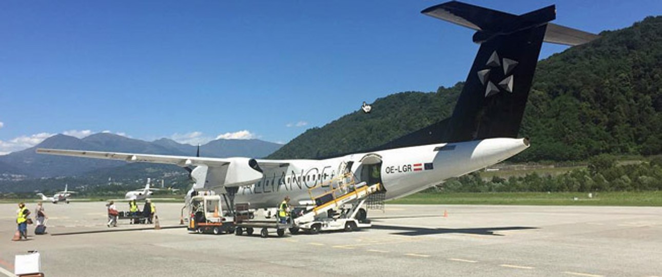 AUA-Dash-8 in Lugano: Drei Mal pro Tag für Swiss nach Genf unterwegs.
