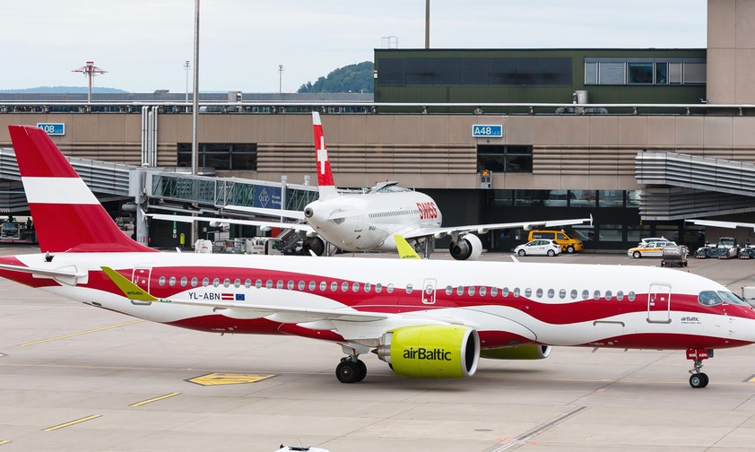 Flugzeuge von Air Baltic und Swiss in Zürich: Lohndumping?