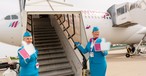 Eurowings-Flugbegleiterinnen vor einem Flug in die USA: Bald gibt es eine neue Marke.