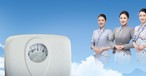 Flugbegleiterinnen von Hainan Airlines: Müssen ihr Gewicht kontrollieren.