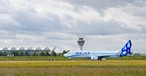 Boeing 737 von Scat Airlines am Flughafen München (Montage): Ende Mai sollen die Flüge starten.