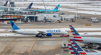 Flugzeuge von American Airlines und United am Flughafen Chicago O'Hare: Beide Airliens kämpfen um Marktanteile. 