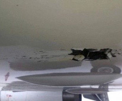 Riss im Rumpf des Airbus A319 von Shenzen Airlines: Das Flugzeug setzte vor Landebahn auf.