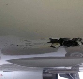 Riss im Rumpf des Airbus A319 von Shenzen Airlines: Das Flugzeug setzte vor Landebahn auf.