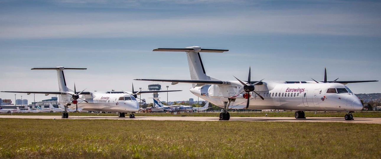 Flughafen Bratislava: <a href="https://www.aerotelegraph.com/bratislava-wandelt-sich-zum-abstellflughafen">In der Slowakei parken Dash 8</a> von Eurowings und Austrian Airlines.