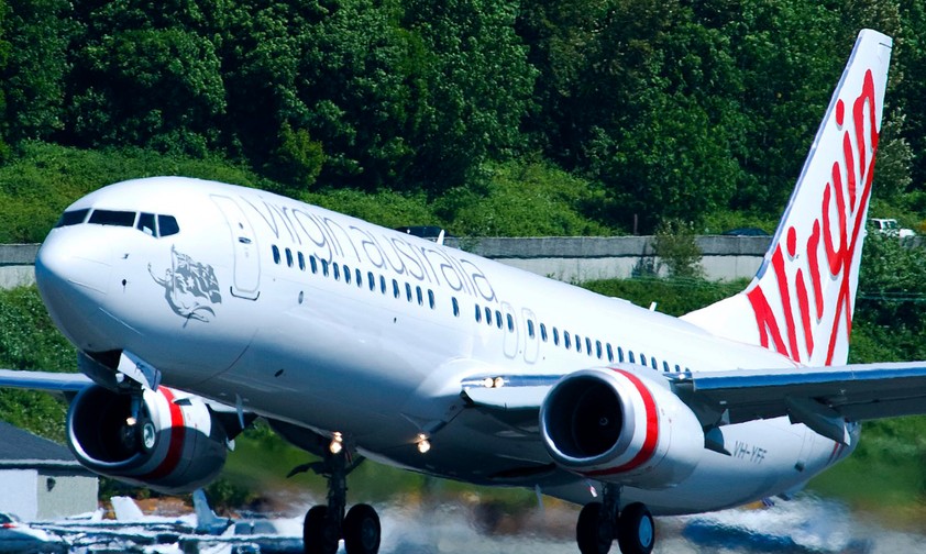 Virgin Australia (hier eine Boeing 737-800): Die Airline muss sich für den Toilettenvorfall rechtfertigen.